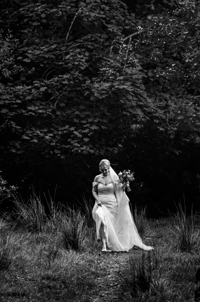bride poses in wedding dress at an Irish wedding